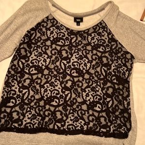 Gray sweatshirt with lace detail.